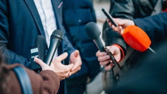 Press interviewing a charity