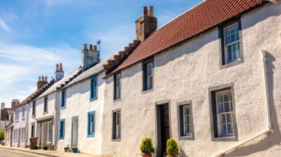 Row of traditional seaside cottages on a incline